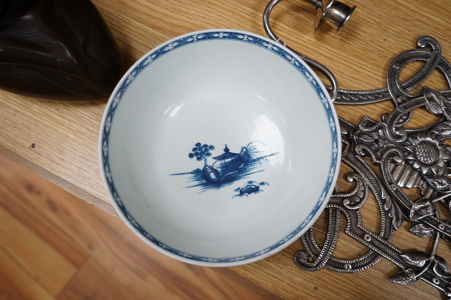 A Worcester coffee cup and saucer, Milkmaid pattern by Hancock, a pair of English porcelain shell salts, and a Worcester blue and white bowl, 18cm (5). Condition - fair